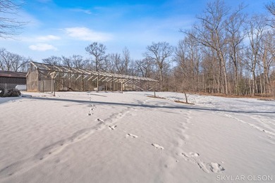 Set privately on 15 acres of rolling woods and water, this rare - photo 45