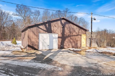 Set privately on 15 acres of rolling woods and water, this rare - photo 50