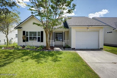 Welcome home to this charming 3-bedroom, 2-bath home with a - photo 1