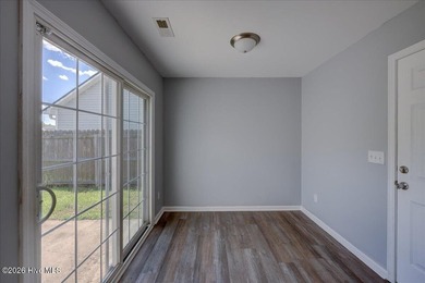 Welcome home to this charming 3-bedroom, 2-bath home with a - photo 10