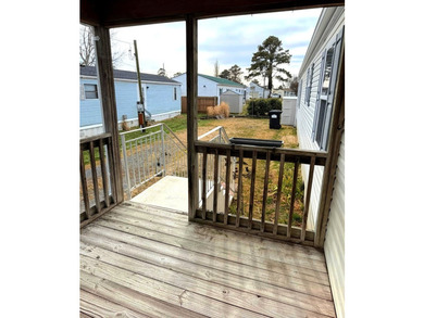 Own a little piece of Chincoteague with this darling Mobile Home - photo 12