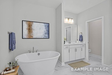 Welcome to this stunning three-story residence, a masterpiece of - photo 4