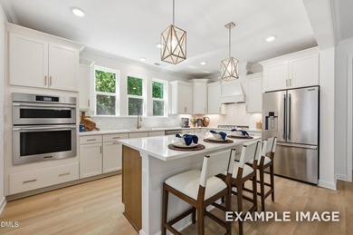 Welcome to this stunning three-story residence, a masterpiece of - photo 7