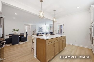 Welcome to this stunning three-story residence, a masterpiece of - photo 8