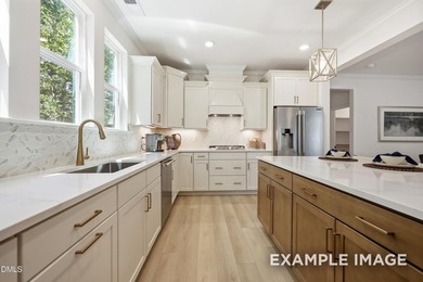 Welcome to this stunning three-story residence, a masterpiece of - photo 9