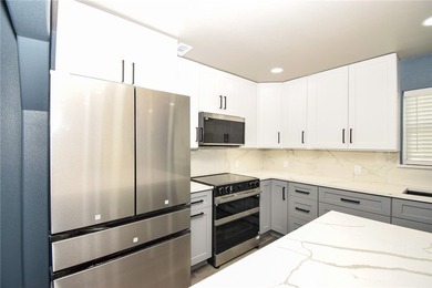 Completely rebuilt and beautifully updated, this move-in ready - photo 10
