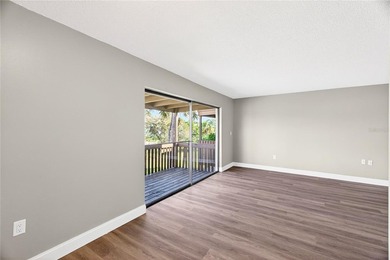 Spacious second floor 1 bedroom 1 bathroom totally updated condo - photo 5
