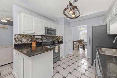 Experience the Best of Navarre Living! This charming 4-bedroom - photo 4