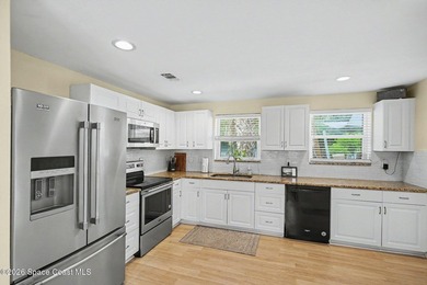Welcome home to this move-in ready 3 bed, 2 bath home in Palm - photo 3