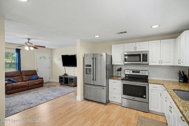 Welcome home to this move-in ready 3 bed, 2 bath home in Palm - photo 6
