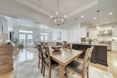This extraordinary waterfront end unit condo, nestled in the - photo 11