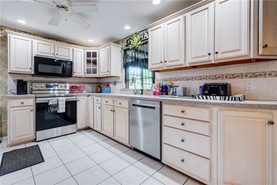 Versatile Gates ranch with a true possible in-law setup! The - photo 14