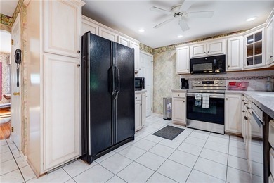 Versatile Gates ranch with a true possible in-law setup! The - photo 15