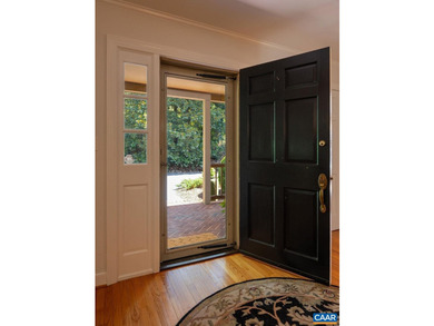 This custom Smith & Robertson, brick & cedar Cape is located on - photo 5