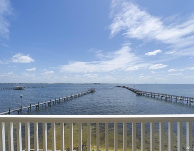 This extraordinary waterfront end unit condo, nestled in the - photo 16