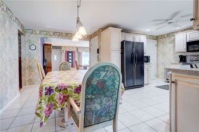 Versatile Gates ranch with a true possible in-law setup! The - photo 17