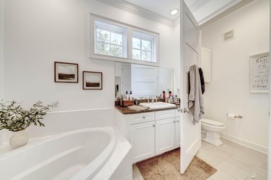 This extraordinary waterfront end unit condo, nestled in the - photo 21