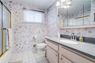 Versatile Gates ranch with a true possible in-law setup! The - photo 22