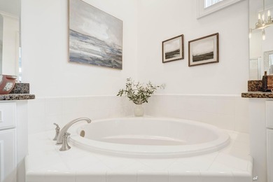 This extraordinary waterfront end unit condo, nestled in the - photo 23