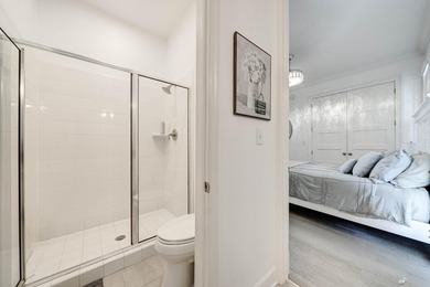 This extraordinary waterfront end unit condo, nestled in the - photo 28