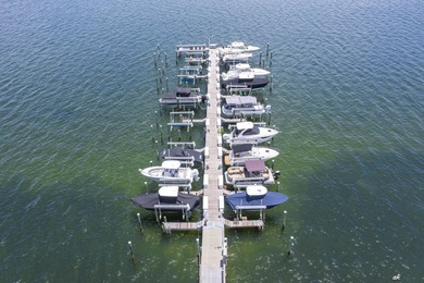 This extraordinary waterfront end unit condo, nestled in the - photo 38