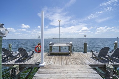 This extraordinary waterfront end unit condo, nestled in the - photo 42