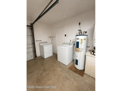 Open floor plan with galley style kitchen. Lots of closet space - photo 9