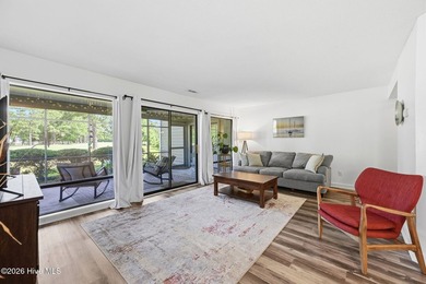 Welcome to this beautifully updated, ground-floor condominium - photo 2