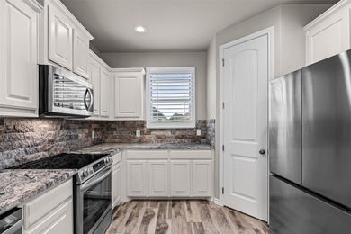 Beautifully maintained 4-bedroom, 2-bath home in the newest area - photo 12