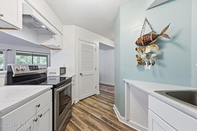 Welcome to this beautifully updated, ground-floor condominium - photo 6