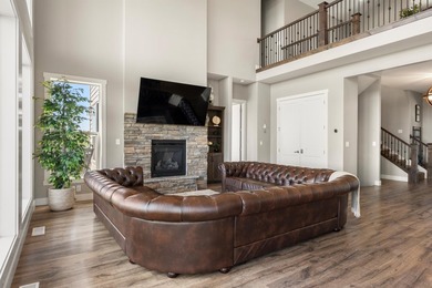Welcome to 68 Hawksbeard Circle, a remarkable 8-bedroom, 5 - photo 7