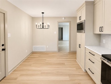 Welcome to your beautifully remodeled dream home in one of - photo 5
