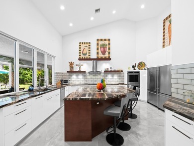 Welcome to this breathtaking 5-bedroom, 3.5-bath estate in the - photo 18