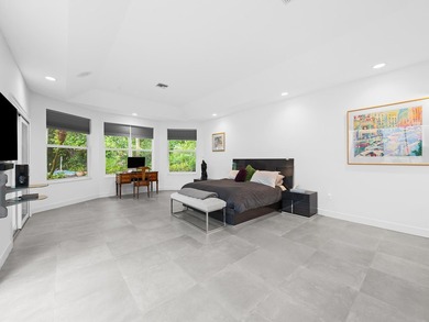 Welcome to this breathtaking 5-bedroom, 3.5-bath estate in the - photo 28