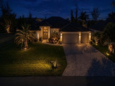 This Gulf access pool home in Cape Coral offers a rare blend of - photo 2