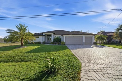 This Gulf access pool home in Cape Coral offers a rare blend of - photo 5