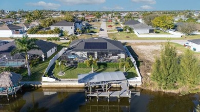 This Gulf access pool home in Cape Coral offers a rare blend of - photo 6