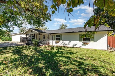 Charming 4-bedroom, 2-bath home in the heart of Little Elm! This - photo 2