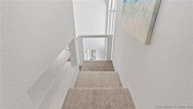 Experience the ultimate Lake of the Ozarks lifestyle in this - photo 15