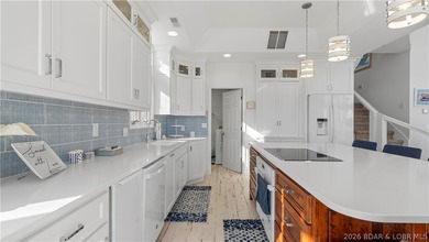 Experience the ultimate Lake of the Ozarks lifestyle in this - photo 16