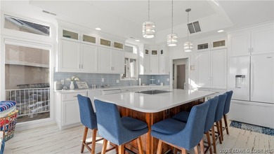 Experience the ultimate Lake of the Ozarks lifestyle in this - photo 21
