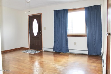 Welcome to this sweet one and a half story home nestled in the