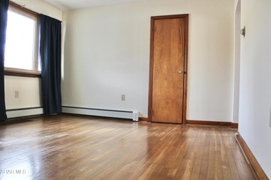 Welcome to this sweet one and a half story home nestled in the