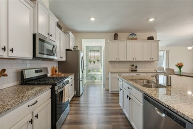 This beautiful 4 bedroom, 2 bath home is located in the - photo 2
