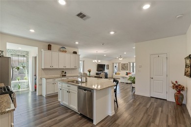 This beautiful 4 bedroom, 2 bath home is located in the - photo 4