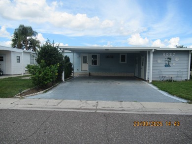 Lake Home For Sale in Zephyrhills, Florida