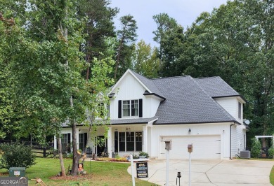 Lake Home For Sale in Cumming, Georgia