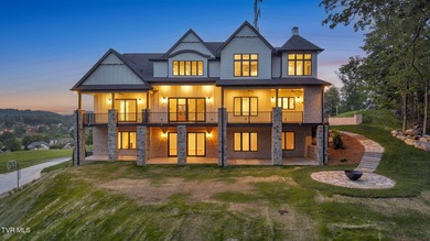 This exquisite gem nestled in the prestigious Ridges subdivision