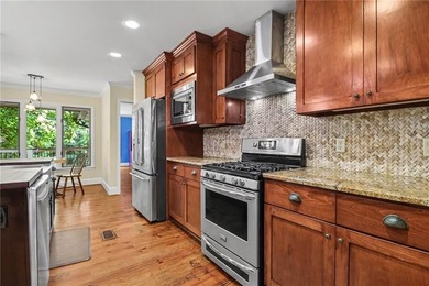 Nestled in a private, picturesque setting, this exceptional - photo 18