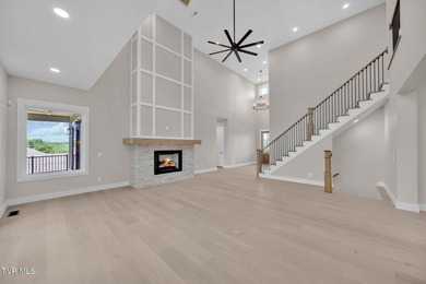 This exquisite gem nestled in the prestigious Ridges subdivision